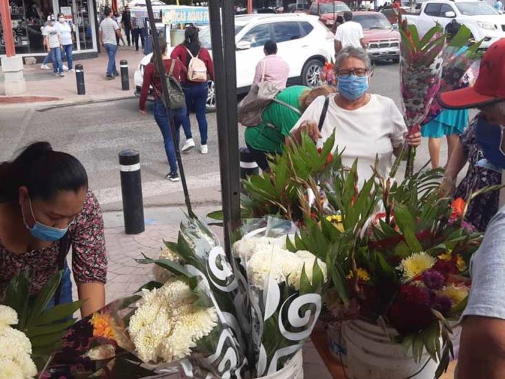 Buscan flores para difuntos Buscan flores para difuntos