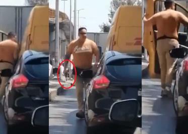 Video. Conductor amenaza con arma a repartidor de DHL Video. Conductor amenaza con arma a repartidor de DHL