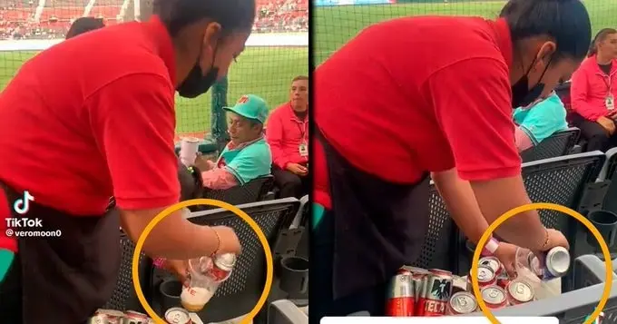 Captan a vendedora de cerveza rellenando vasos en el estadio de los Diablos Rojos del México
