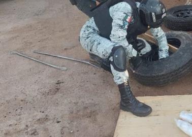 Guardia Nacional decomisa droga oculta en llantas y hielera en Opodepe